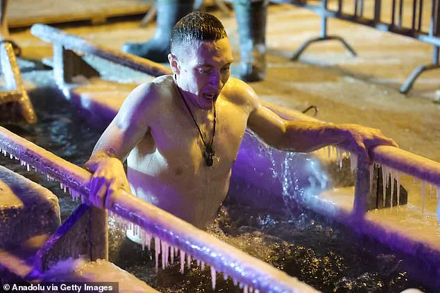 Orthodox Believers Brave Icy Waters for Epiphany Baptism in Russia