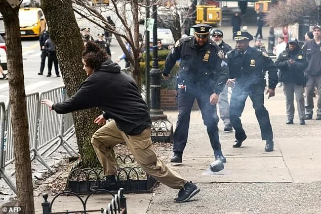 NYPD Assistant Chief's Viral Leap Over Barrier During Confrontation with Protesters Hurling Homemade Bombs